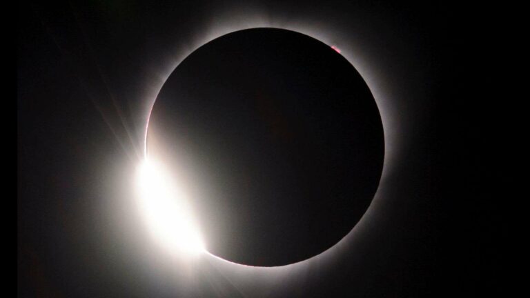 The spectacular diamond-ring effect, which occurs at the beginning and end of totality during a total solar eclipse